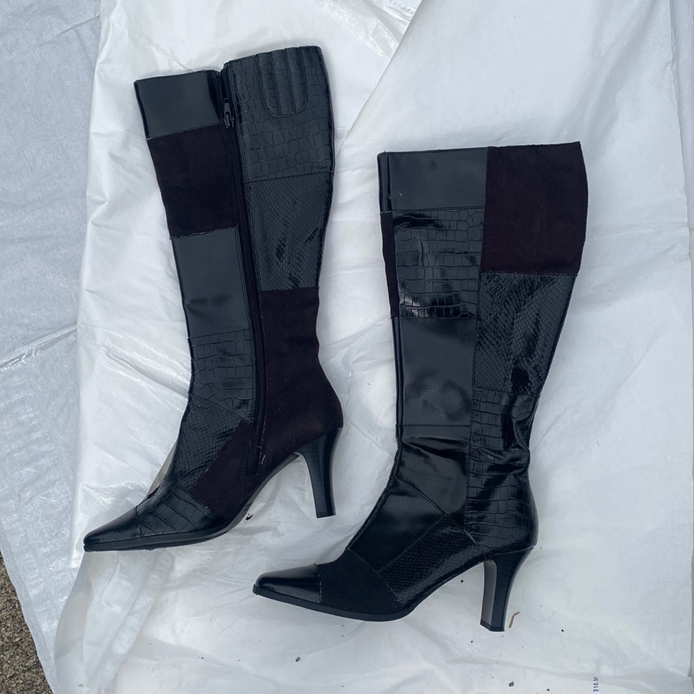 Black thigh high heeled boots